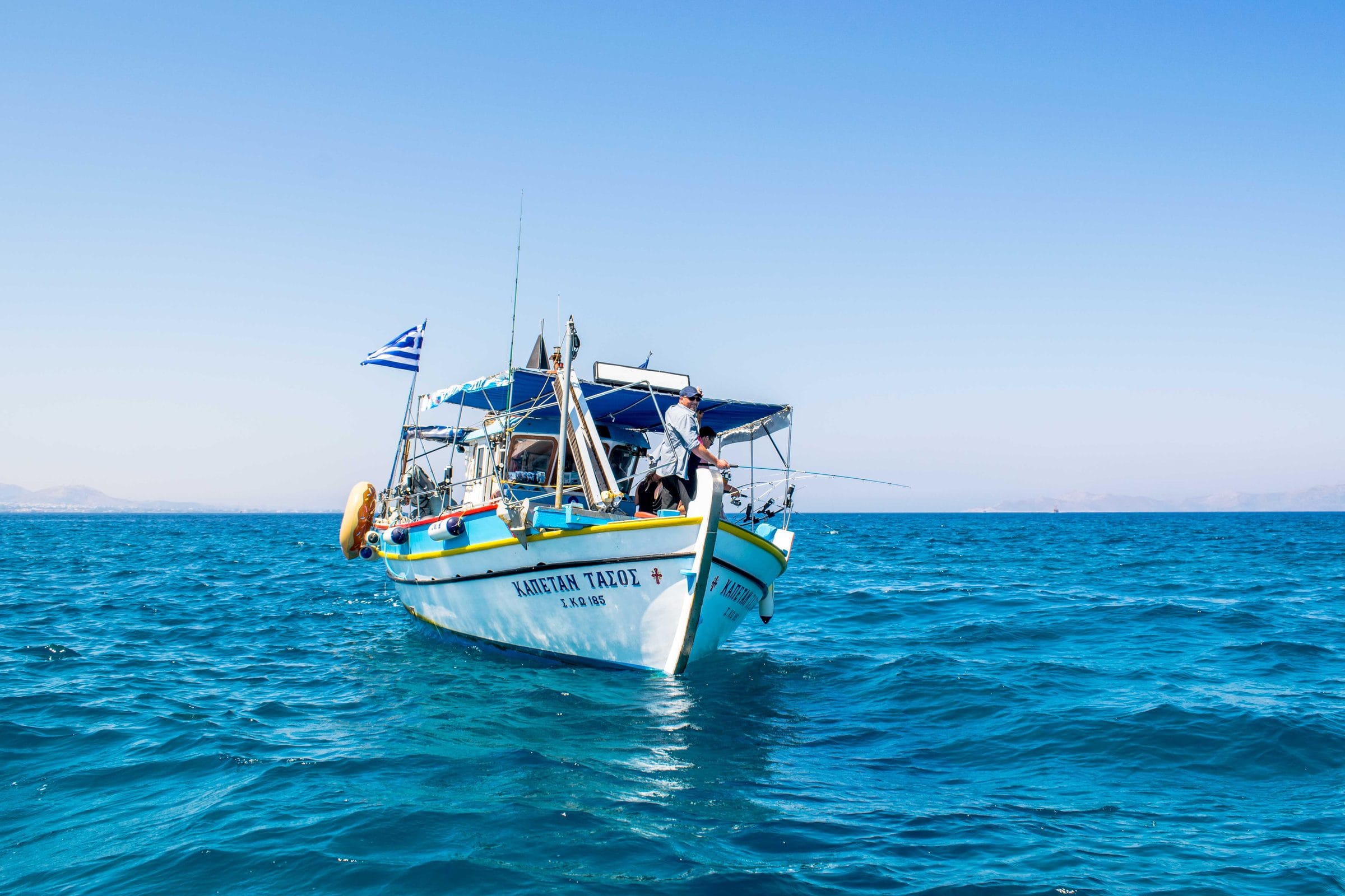 The Captain Tasos under way on the Aegean off Kos, with ΚΑΠΕΤΑΝ ΤΑΣΟΣ painted on the bow