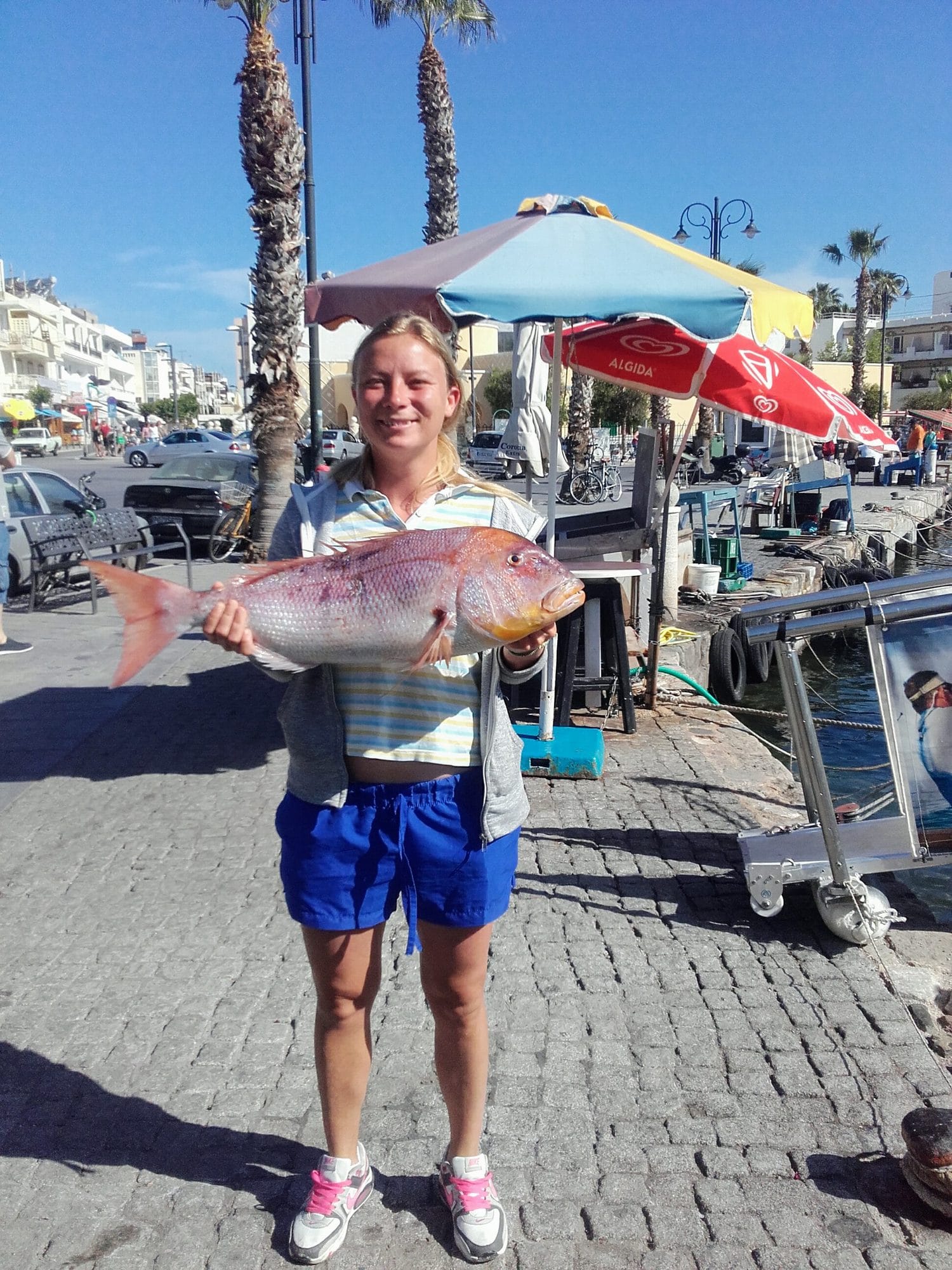 May 2017. Timi on the quay with a big pink seabream caught that morning.